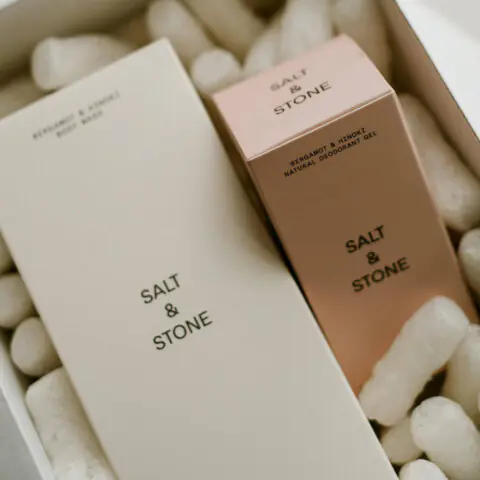 A box set of natural body wash and deodorant resting on packing. Photo by Valeriia Miller on Pexels.
